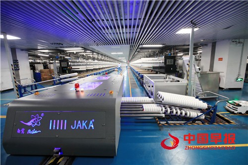 1665366717110357.jpg 白鹭集团氨纶智能生产线及自动落丝设备.jpg